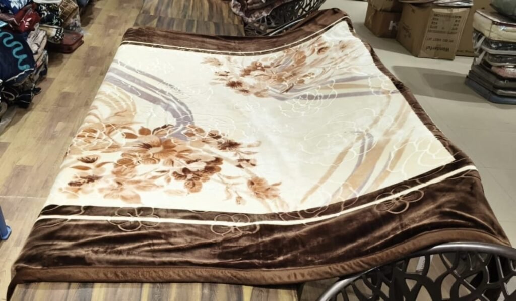 Brown floral mink blanket displayed in a showroom